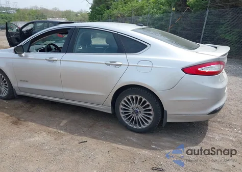 2013 Ford Fusion Hybrid Titanium from USA, damaged, VIN 3FA6P0RU7DR281902